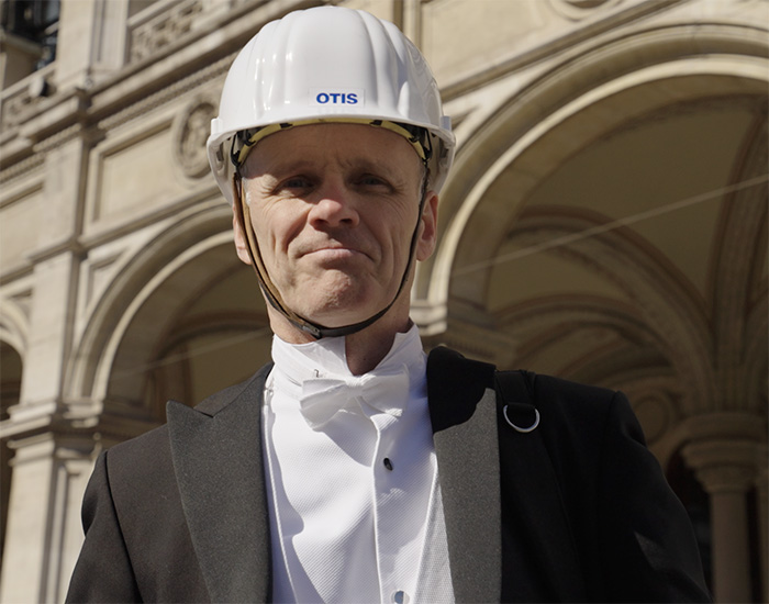 Otis technician in tuxedo at Vienna Opera House