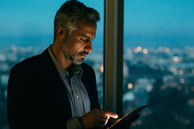 A person operating his mobile