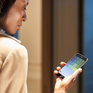 woman looking at otis ecall app