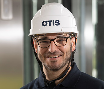 smiling Otis mechanic