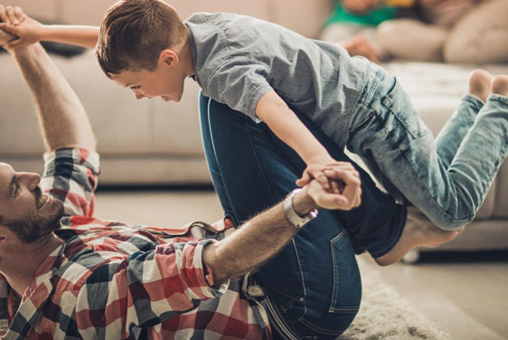 Man and child playing