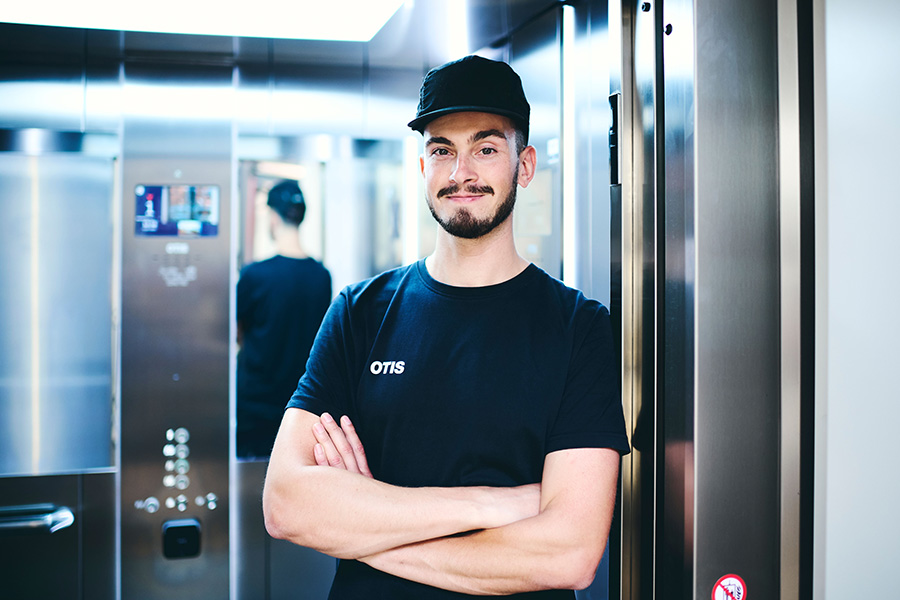A man standing in the elevator