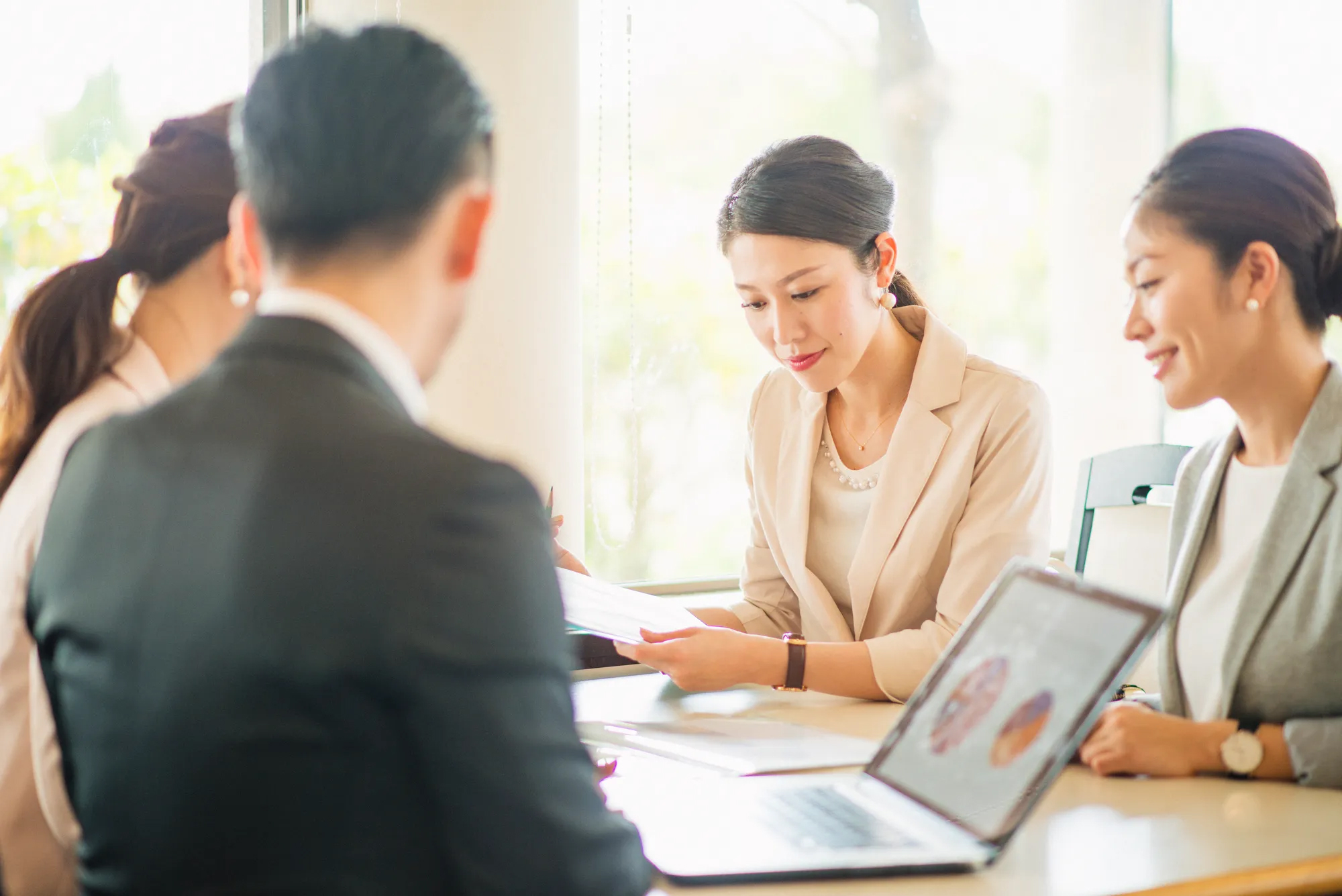 japan office workers around a table