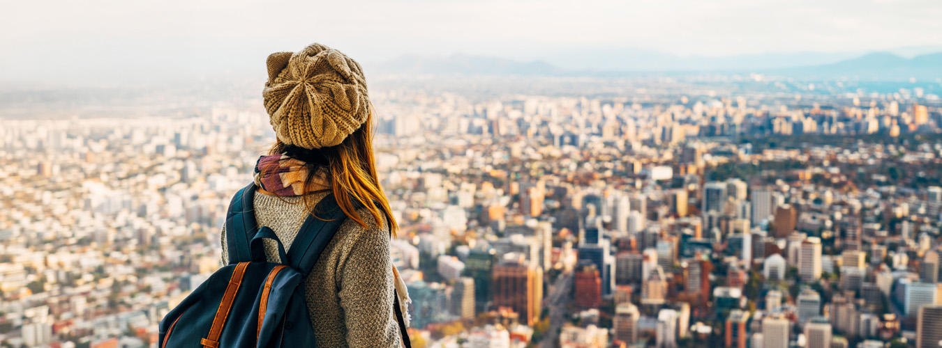 woman looking at a city skyline