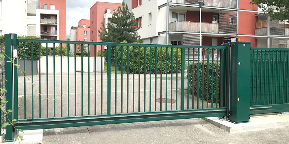 building with green gates